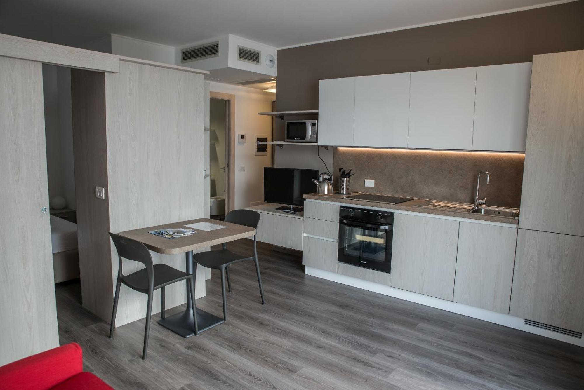 Апартаменти Residenza Luigina Варенна Номер фото